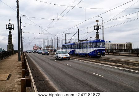 Riga, Latvia - April 01, 2018: View To The Bridge At The Spring Cloudy Day
