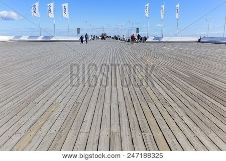 Sopot, Poland - June 6, 2018: Wooden Sopot Pier In Sunny Day. It Is The Longest Wooden Pier In Europ