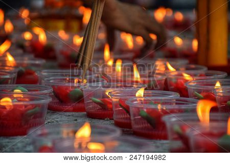 Light The Incense Sticks With Red Candle - Spring Festival