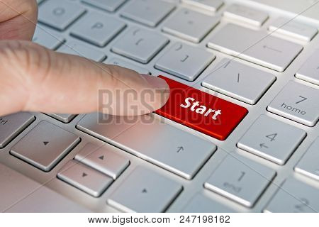 Start On Red Enter Button On Black Keyboard. Red Button.