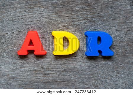 Colorful Plastic Alphabet In Word Adr (abbreviation Of Adverse Drug Reaction) On Wood Background