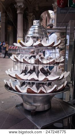 Pieces Of Coconut With Fresh Water Exposed In A Kiosk For Selling In Milan
