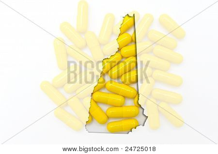 Kontur kort over New Hampshire med gennemsigtig piller i baggrunden