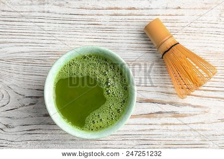 Chawan With Fresh Matcha Tea And Chasen On Table, Top View