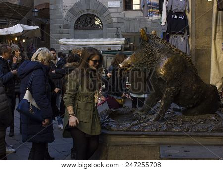 Florence, Italy - November 22 2015: People Around The Porcellino Statue In Florence, That Bring Good