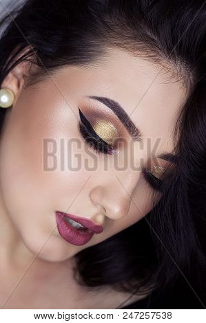 Beautiful Brunette With Professional Make-up