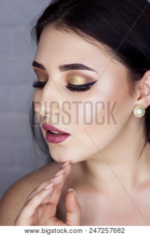 Beautiful Brunette With Professional Make-up