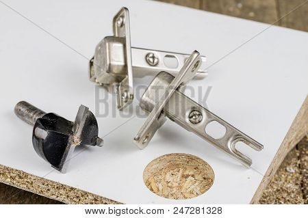 Milling Cutter For Fixing Hinges In Chipboard. Joinery Accessories For Furniture Construction.