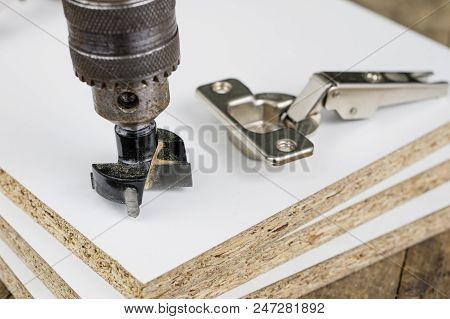 Milling Cutter For Fixing Hinges In Chipboard. Joinery Accessories For Furniture Construction.