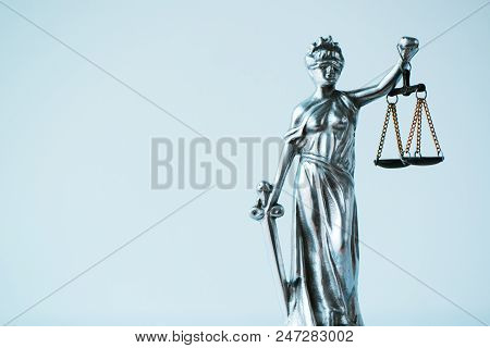 Lady Justice Statue In Law Firm Office