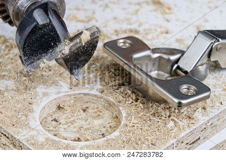 Milling Cutter For Fixing Hinges In Chipboard. Joinery Accessories For Furniture Construction.