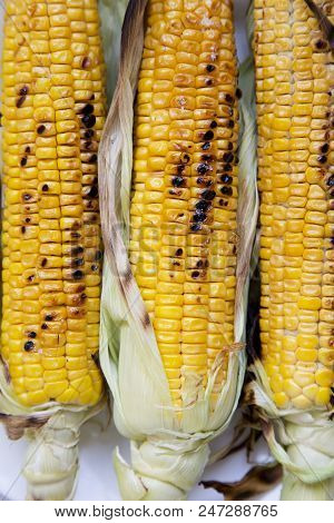 Grilled Corn On The Cob, Close-up. Top View, Flat-lay.