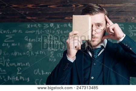 Keep In Mind. Teacher Formal Wear And Glasses Looks Smart, Chalkboard Background. Man Unshaven Holds