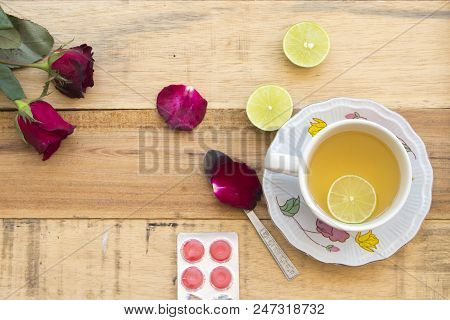 Herbal Health Care Hot Mix Honey Lemon And Cough Sore Throat Pastille Pills With Red Rose Flower On 