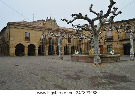 Main Facade Of The Town Hall In The Plaza Mayor On A Very Cloudy Day In San Vicente De La Sonsierra.