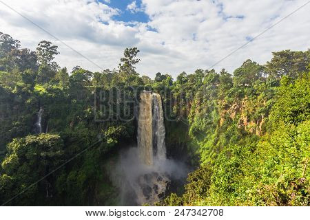 Landscape With A Waterfall And Clouds. Thompson Waterfall. Kenya, Africa