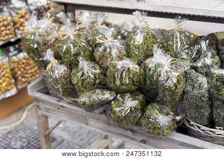 Bunches Of Oregano On Wooden Stand In A Local Market