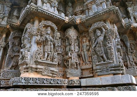 Ornate Wall Panel Reliefs Depicting From Left Goddess Lakshmi, Deities, A Sage, And Krishna As Govar