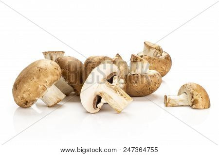 Brown Champignons One Sliced In Two Halves Isolated On White Background Fresh Raw Mushrooms Heap
