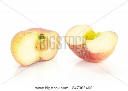 One Fresh Ripe Saturn Peach Cut In Two Halves Isolated On White Background
