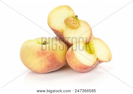 Fresh Ripe Saturn Peaches Heap And Two Sliced Halves Isolated On White Background