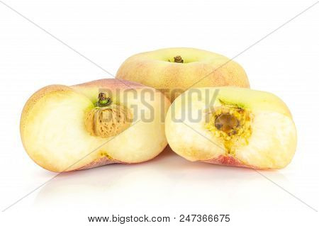 One Fresh Ripe Saturn Peach With Two Halves Isolated On White Background