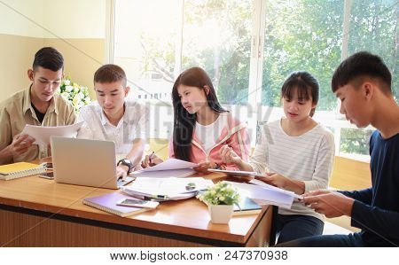 Co Working Team Meeting Concept: New Asian Genaration Business People Working And Studying Together 