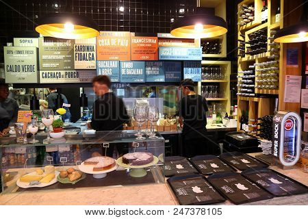 Lisbon, Portugal - June 6, 2018: Restaurant Workers At Timeout Market In Lisbon, Portugal. Timeout M
