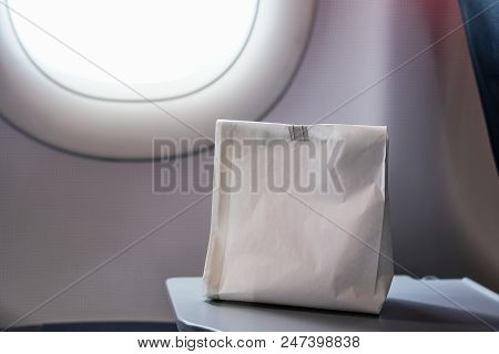 Airsick Nauseous Person In The Air Sickness Vomit Bag Prepared To Vomit