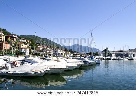 Lake Waith Boats On The Water. Beautiful Landscape In Italy With Boats On The Water.