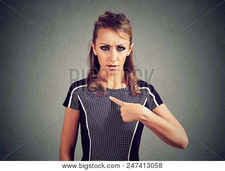Confused Woman Pointing At Herself With Finger. Offended Female Having Quarrel Looking With Wonder P