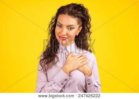 Faithful Woman Keeps Hands On Chest Near Heart, Shows Her Kindness, Expresses Sincere Emotions, Bein