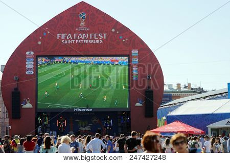 ST. PETERSBURG, RUSSIA - JUNE 28, 2018: Football fans at FIFA Fan Fest in Saint Petersburg during the FIFA World Cup 2018 match Colombia vs Senegal. Colombia won 1-0