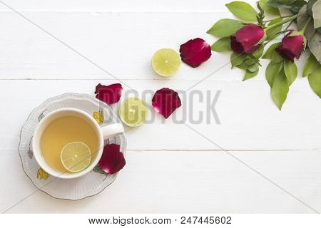 Herbal Health Care Hot Mix Honey Lemon And Cough Sore Throat Pastille With Red Rose Flowers On Backg