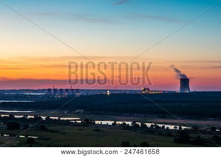 Natural Landscape With Npp Or Nuclear Power Plant After Sunset