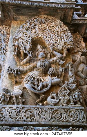 Sculpture Of Goddess Sarswati Dancing, Hoysaleshwara Temple, Halebidu, Karnataka, India. View From W