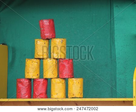 The Cans On A Vintage Fun Fair Sideshow Game.