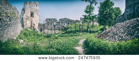 Ruins Of The Castle Gymes In Slovak Republic. Travel Destination. Panoramic Photo. Analog Photo Filt