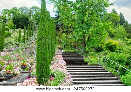 Flower Garden And Other Plants, A Staircase And A Waterfall On The Island Of Mainau (lake Constance,