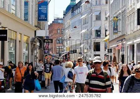 Copenhagen, Denmark - June 27, 2018: People Walking The Stroget Shopping Street In Downtown Copenhag