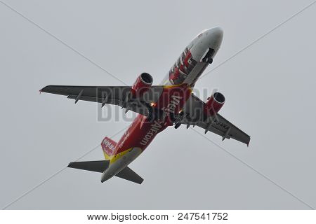 Passenger Airplane Flying In The Sky