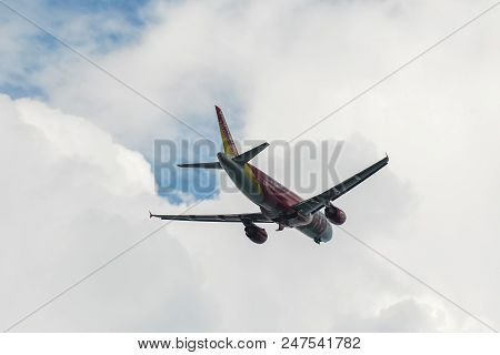 Passenger Airplane Flying In The Sky