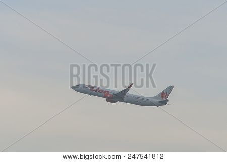 Passenger Airplane Flying In The Sky