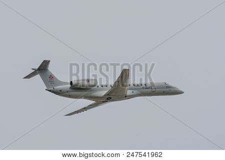Passenger Airplane Flying In The Sky