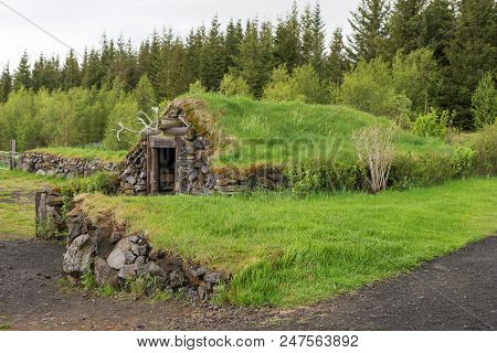Stone Hut With Grass Roof In Reykholt. Iceland