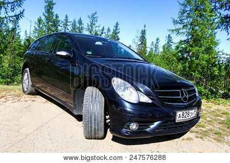 Novyy Urengoy, Russia - June 27, 2018: Black Motor Car Mercedes-benz W251 R350 At The Countryside.