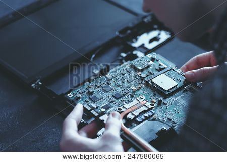 Computer Hardware Development. Microelectronics Technology Science Concept. Engineer Holding Modern 
