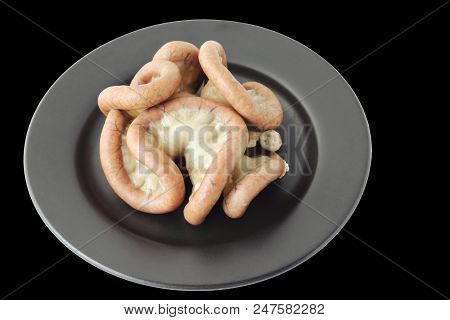 Chitterlings Internal Organs Of Pig Isolated On Black Plate, Clipping Path.