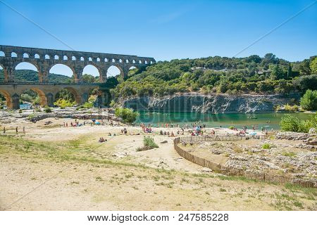 Remoulins,france-august 12, 2016:people Pont Du Gard Roman Aqueduct