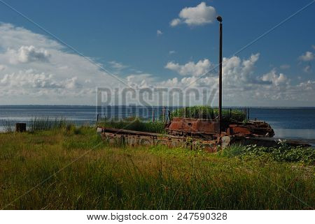 Old Pier For Small Boats In The Sea Bay